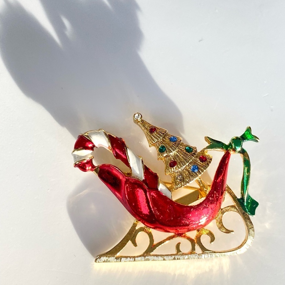 Elegant Gold and Red Sleigh Brooch with Christmas Tree